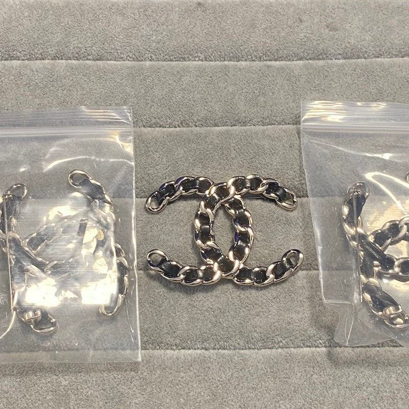 CC Black Leather Gold Brooch