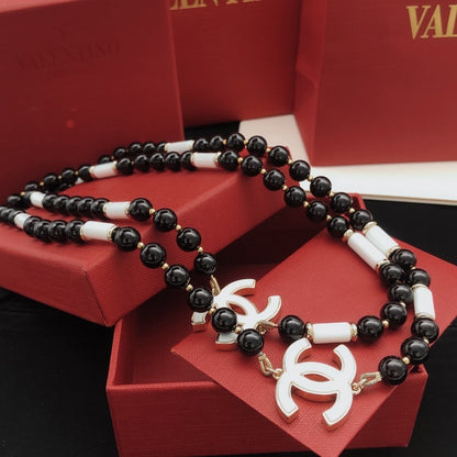 CC White Logo Long Black Pearl Necklace