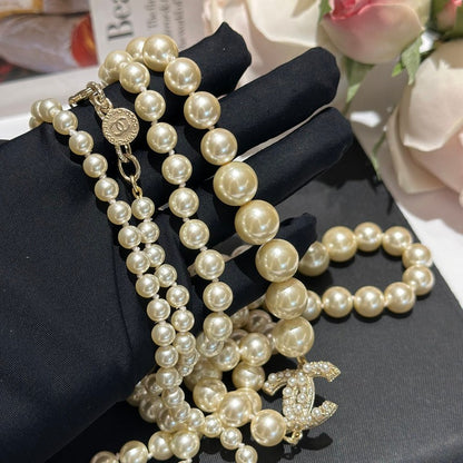 CC 100th Anniversary Fuax Pearl Long Necklace